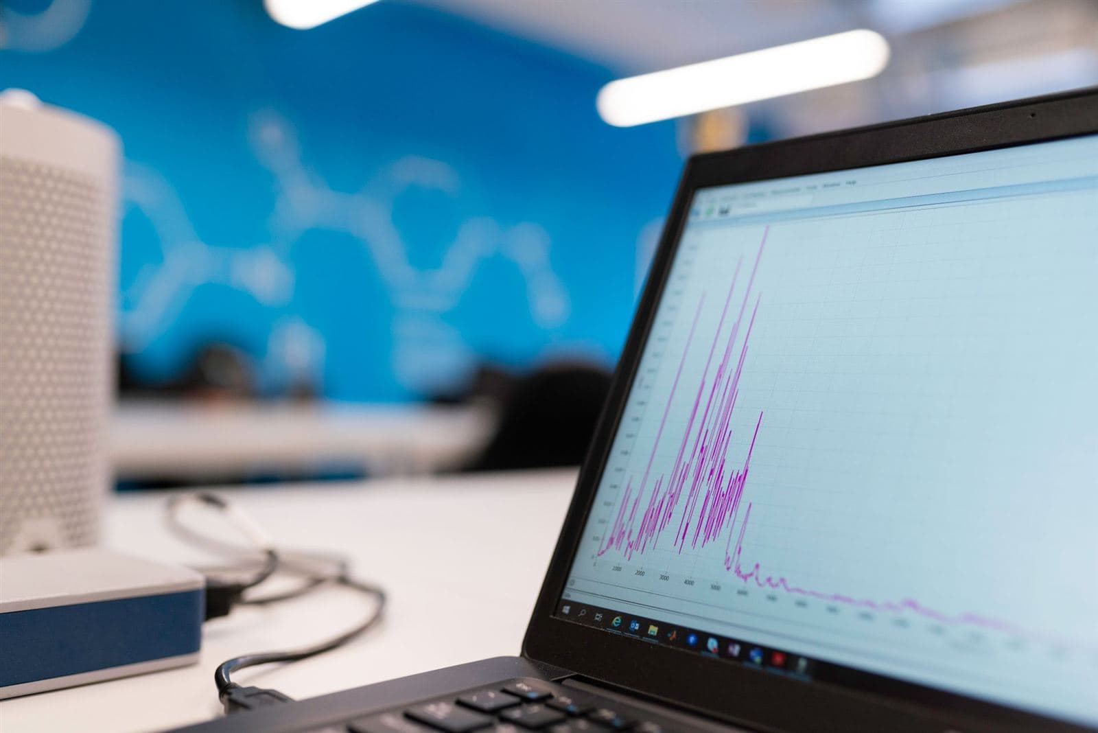 A laptop showing a portfolio chart
